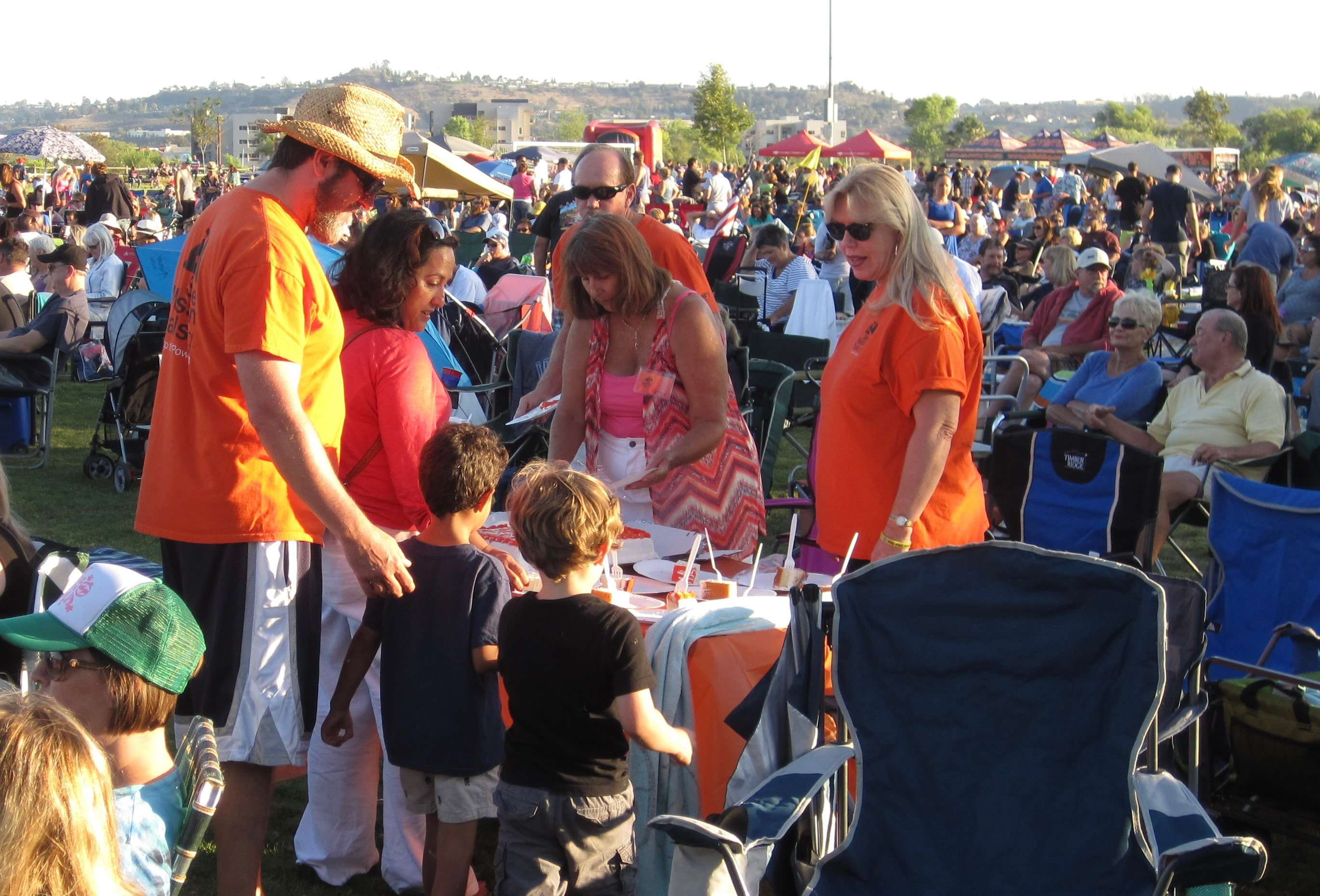 Families at SMT booth at Santee Concerts in the Park
